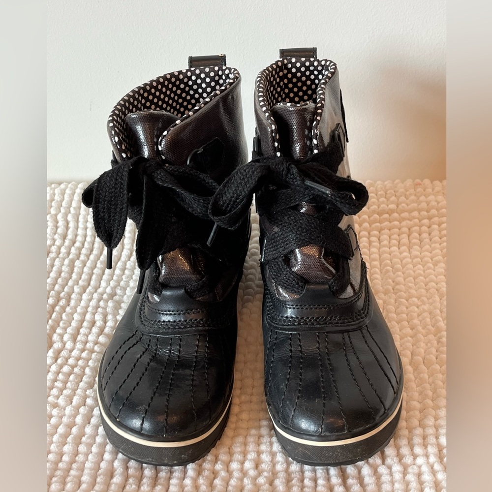 Sorel black water proof ankle winter boots.